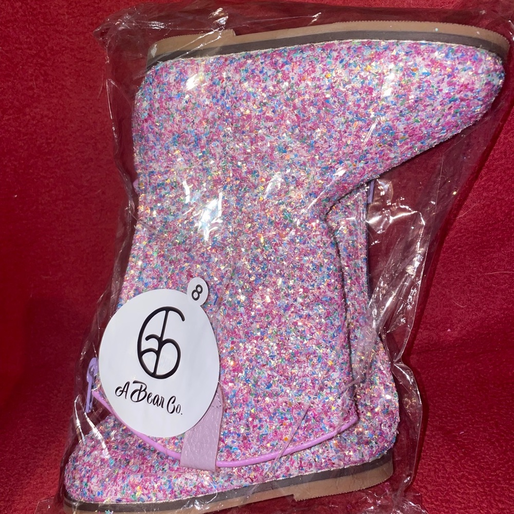 A Bear Co size 8 pink boots. New in bag.